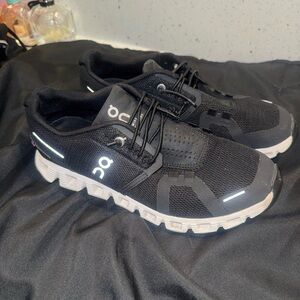 On Running Black and White Sneakers